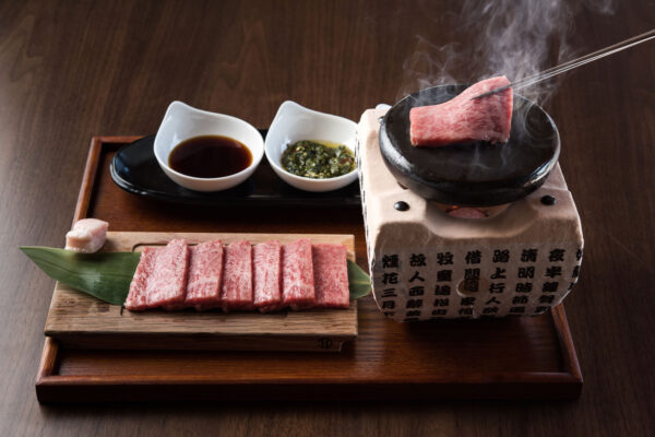 Ishi Yaki A5 beef being cooked