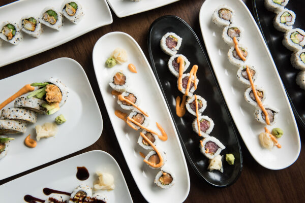 A top down shot of plates of sushi